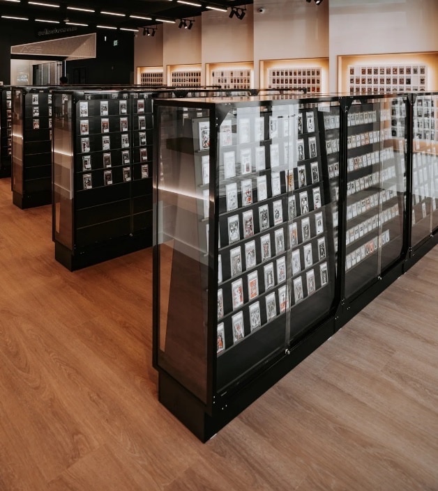 Vault & Victory shop floor, double-sided graded card display cases